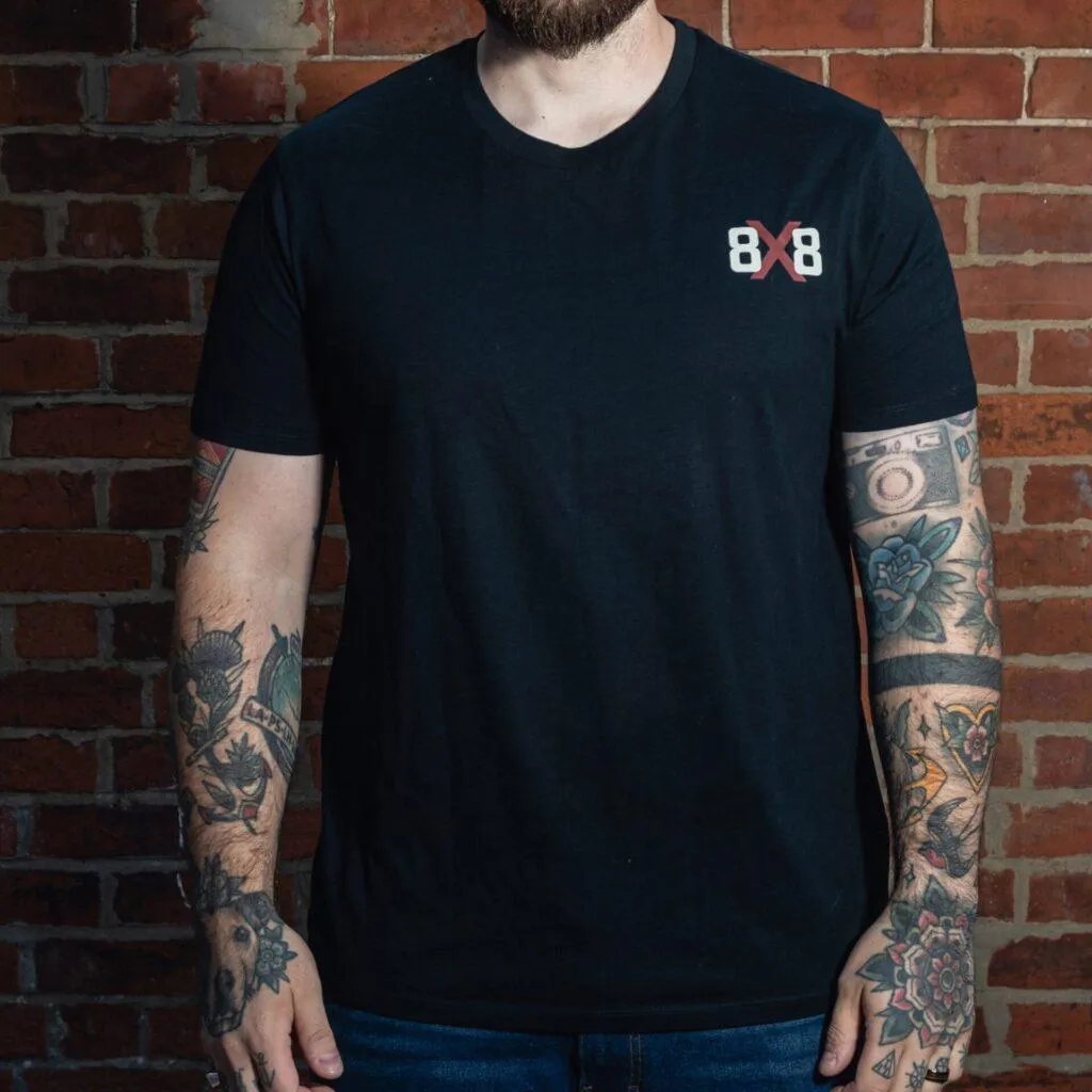 Front view of a black 8x8 T-shirt with the small chest logo.