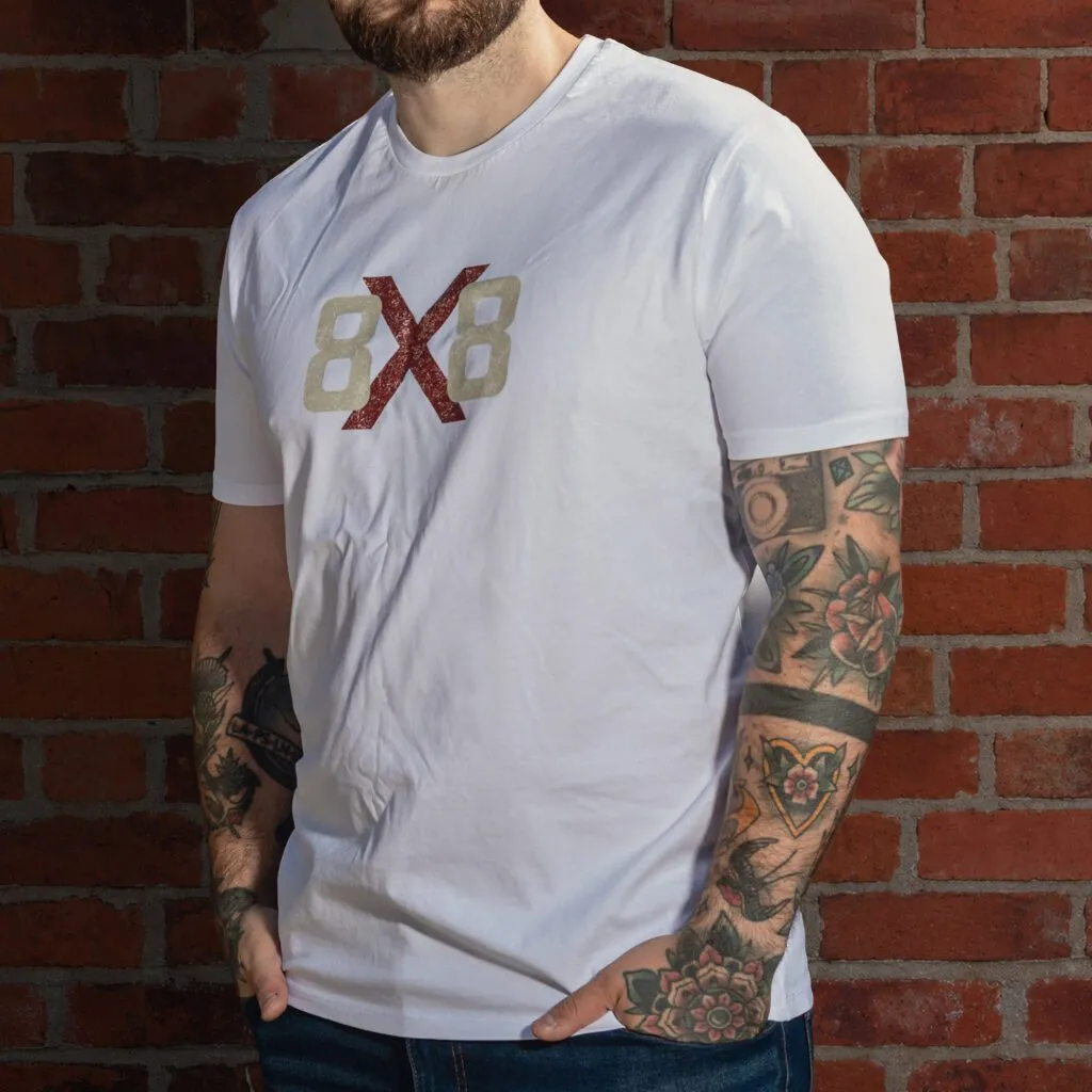 Three-quarter front view of the white 8x8 OG T-shirt with large distressed chest logo.
